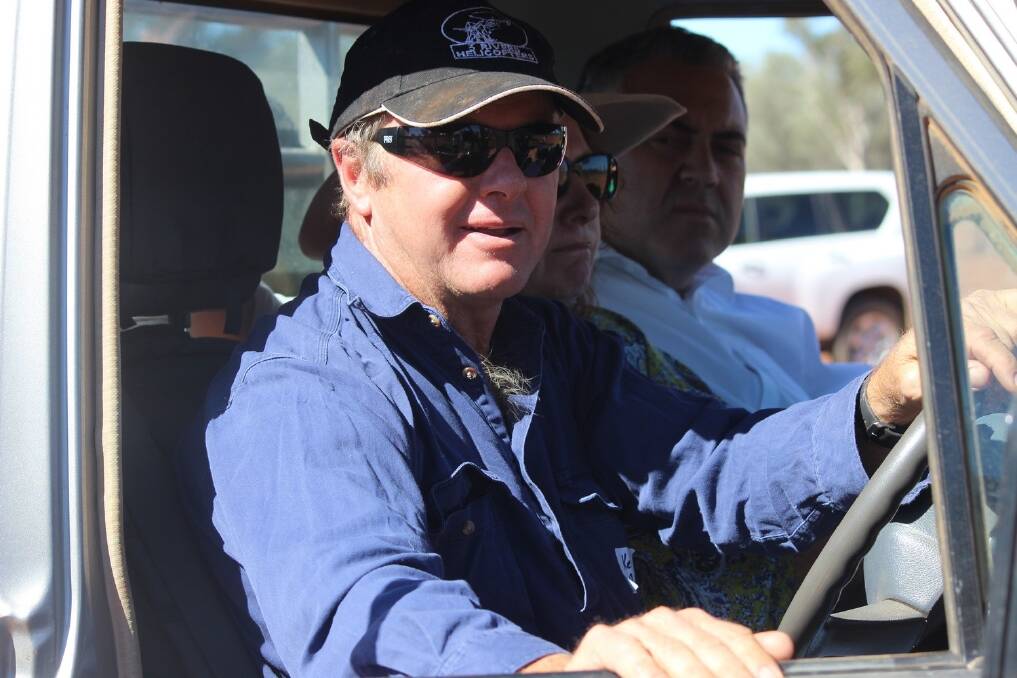 Kelvin and Cathy Rule give Joe Hockey a tour of their drought striken Charleville property