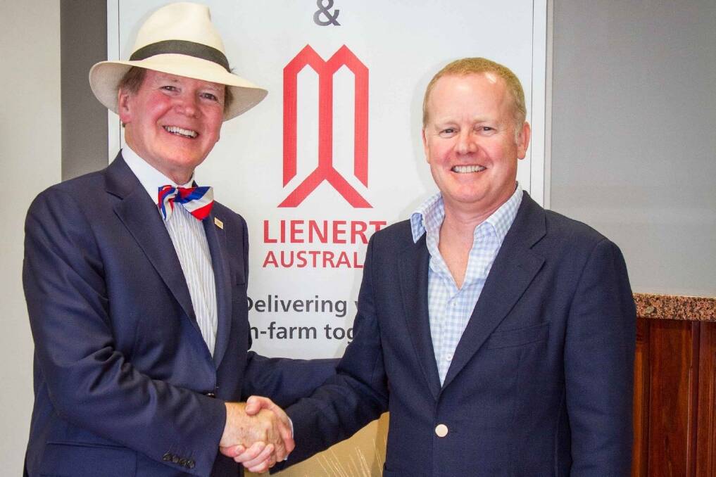 Alltech founder and president Dr Pearse Lyons with Nick Lienert, the managing director of Lienert Australia, as the two celebrate Alltech's purchase of Lienert Australia.