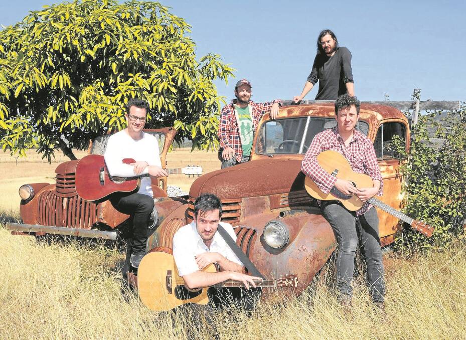 Melbourne musicians Adrian Stoyles (kneeling), Dan Luscombe, Murray Paas, Gus Agars and Ben Salter at their rural recording studio south of Rockhampton. – Picture: SARAH COULTON.