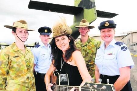 Music star Tania Kernaghan (centre) is warming up to deploy to Winton in April for a key Anzac centenary commemoration.
