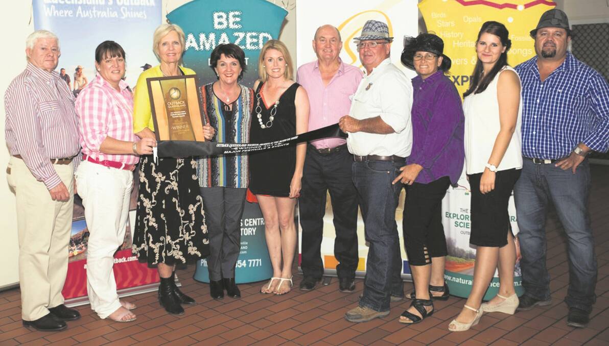 Winners of the Major Festivals & Events category: Birdsville Races staff and volunteers with Tourism Minister Jann Stuckey.