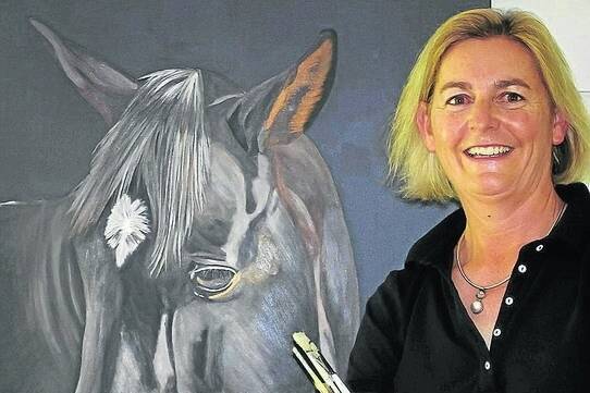 Arist Janet Doyle at her first exhibition, <i>Ponies and Flowers</i>, held in Goondiwindi in late December.
