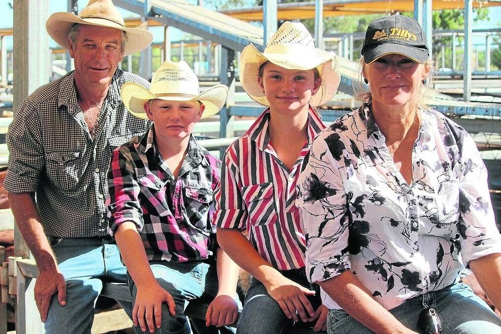 Keith and Karen Harrison and their children Jamen and Tiesha at the Roma store sale on Tuesday. - <i>Picture: PENELOPE ARTHUR.</i>