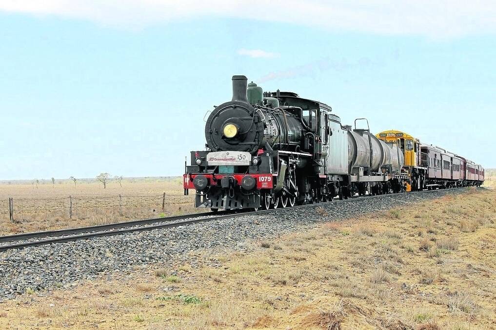 Queensland Rail's steam train Bety is full steam ahead as part of the World War I troop train re-enactment, with her 250 passengers and 20 Queensland Rail volunteers on board travelling the 1400km journey from Winton to Brisbane's Roma Street Station. - <i>Picture Sally Cripps.</i>