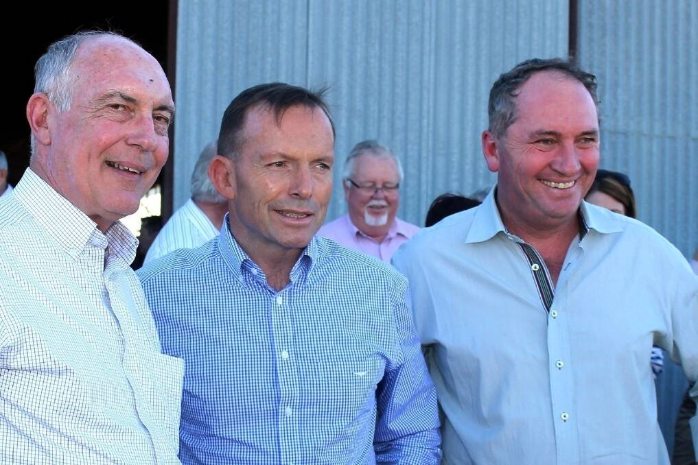 Federal Agriculture Minister Barnaby Joyce (right) assured people at Longreach that the first grade side - deputy PM Warren Truss and PM Tony Abbott and himself - were fighting to make sure the bush could hang on through the drought.