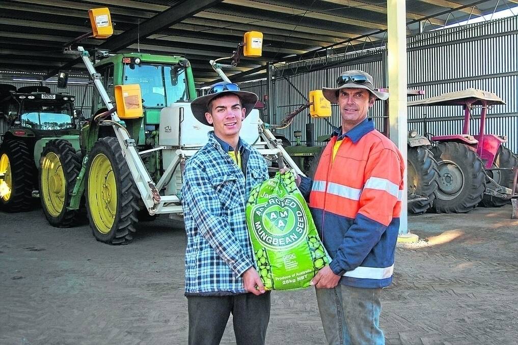 Interest in mungbean continues to grow, even outside the traditional growing regions. Tony (right) and Mitch Chapman have got their hands on a few bags of Jade-AU seed to plant as a trial on their farm near Bundaberg as soon as the soil is warm enough. - <i>Picture: CINDY BENJAMIN.</i>