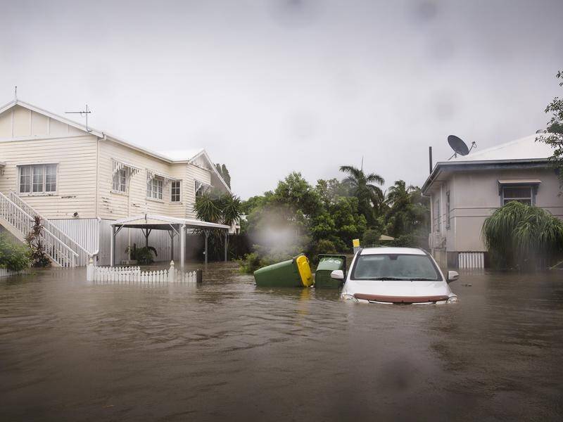 Townsville and swathes of far north Queensland are being battered with more rain and swollen rivers.