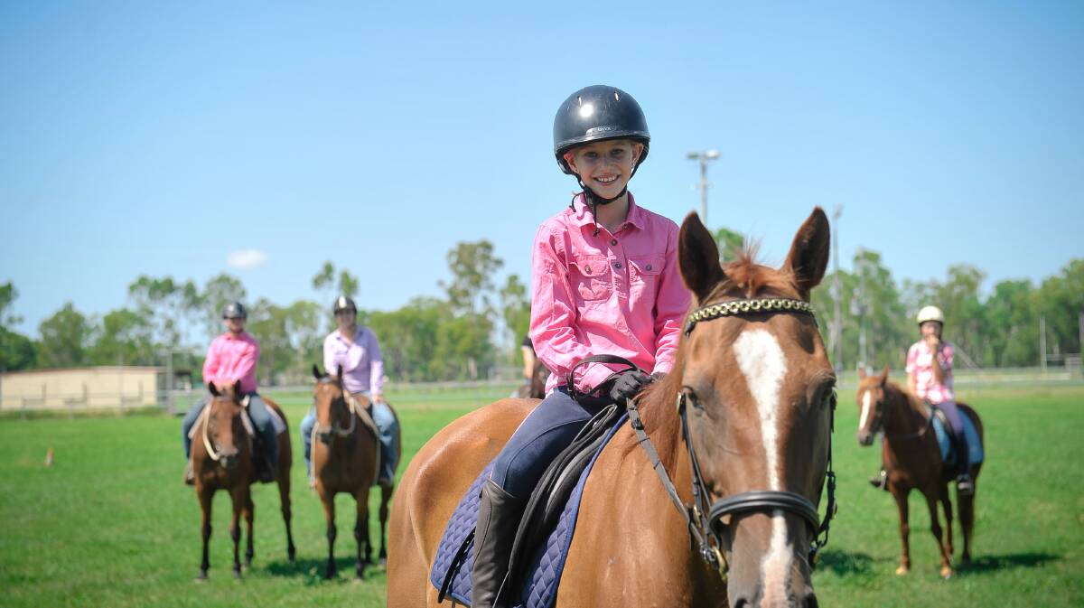 Macy stands before some of her pony club friends. Photo - Kelly Butterworth. 