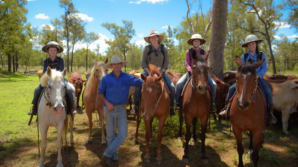 MEET THE COOKS: Tom, Jeff, Sarah, Anna, and Libby Cook mustering at Etonvale, Clermont. Photo - Kelly Butterworth. 