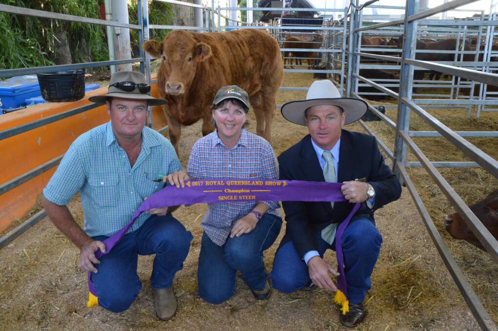 Hero Helix: Jason and Megan Livingstone, Ballycasheen Limousin Stud, Maidenwell, and acting agent Midge Thompson, Aussie Land and Livestock, Kingaroy, with the 2017 champion single steer, Helix.