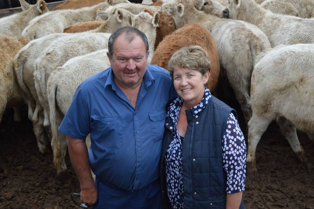 All smiles: Steve and Robyn White, Tarrebar, Roma, were pleased with their results for their 77 weaners on the back of rain in Queensland's south west.