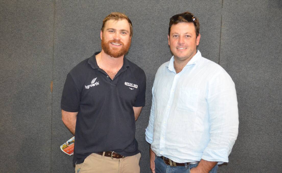 Pacific Seeds' Chris Gillam with irrigated sorghum first and third placegetter, Derryck Mickleborough, Dalby.