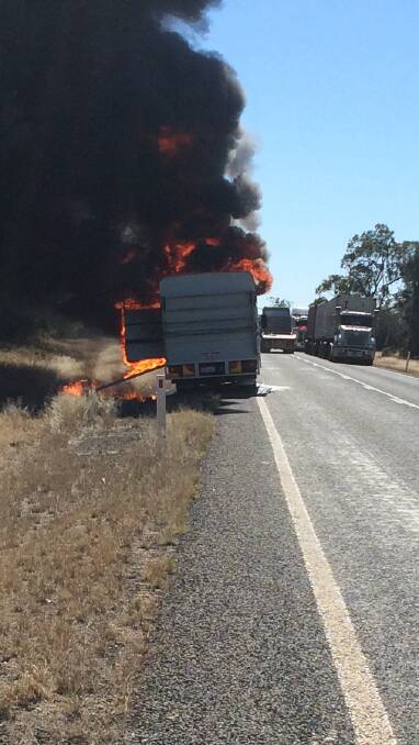 Tom Craig's truck on fire near Muckadilla, almost 12 months ago. Picture supplied.