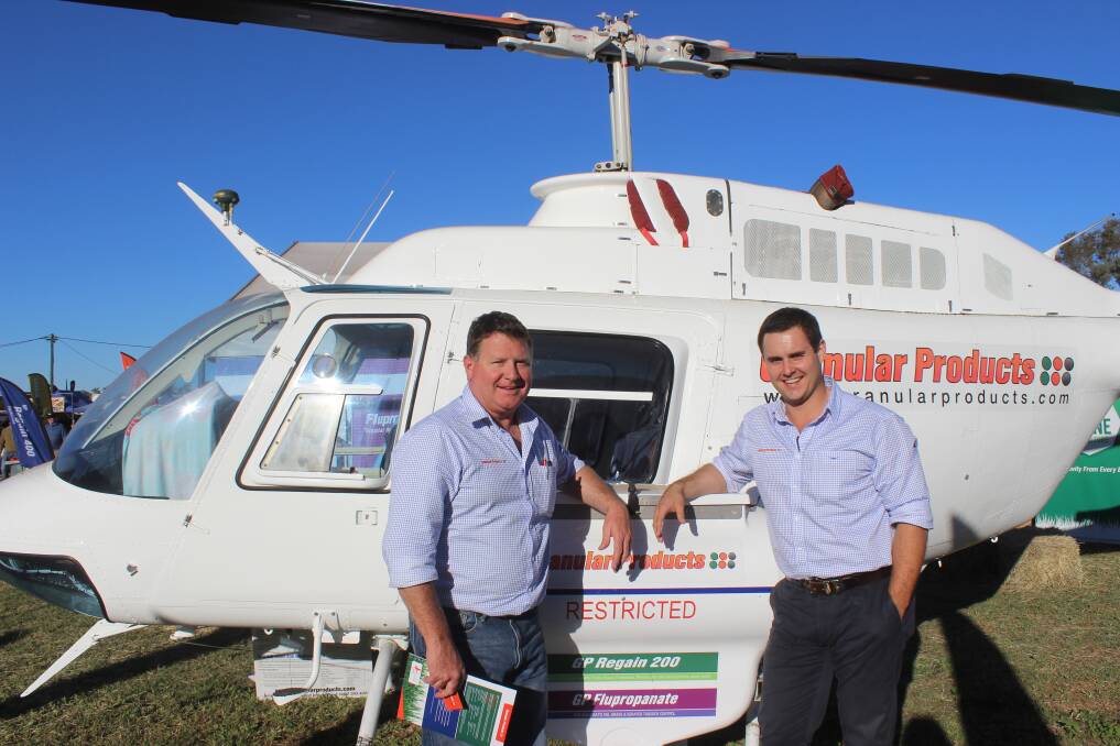  Granular Products sales manager Paul Hubbard with Queensland-based sales representative Sam Doust, Rockhampton at their Ag-Grow field site which was a hive of activity during the event. Picture Helen Walker