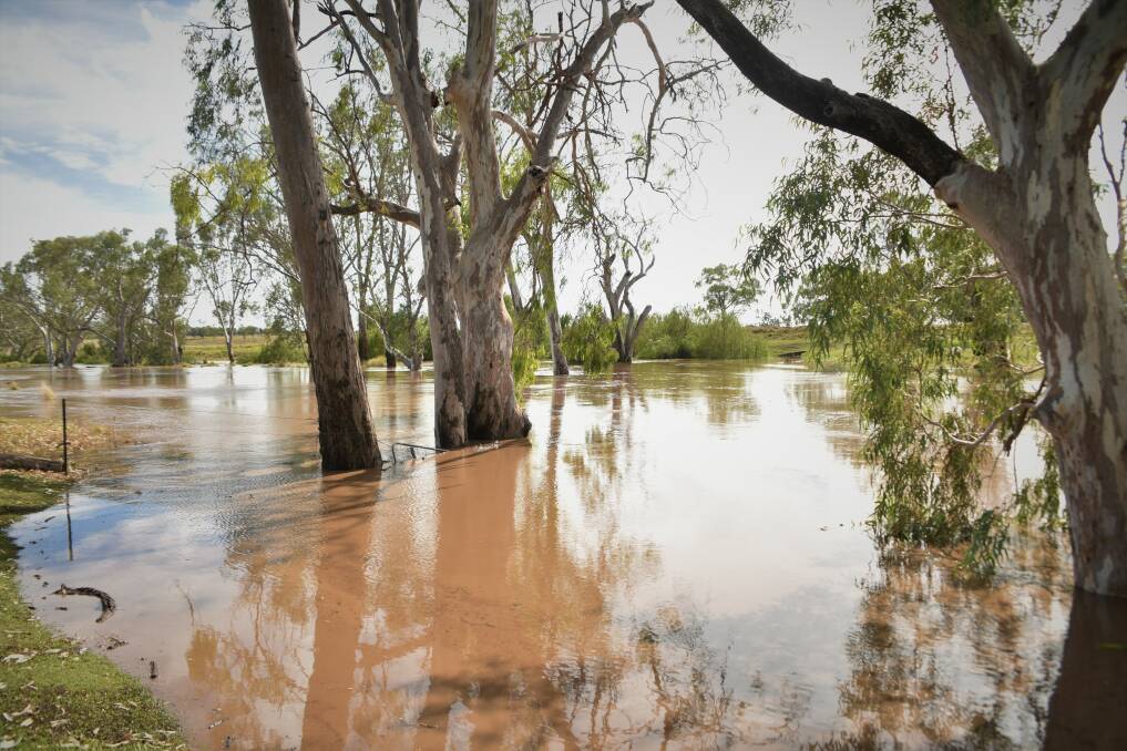 Welcome downpour: Oakey Creek, flowing through Jondaryan Homestead station west of Toowoomba, is rising after much needed rain this week. Picture: Louise Gall.