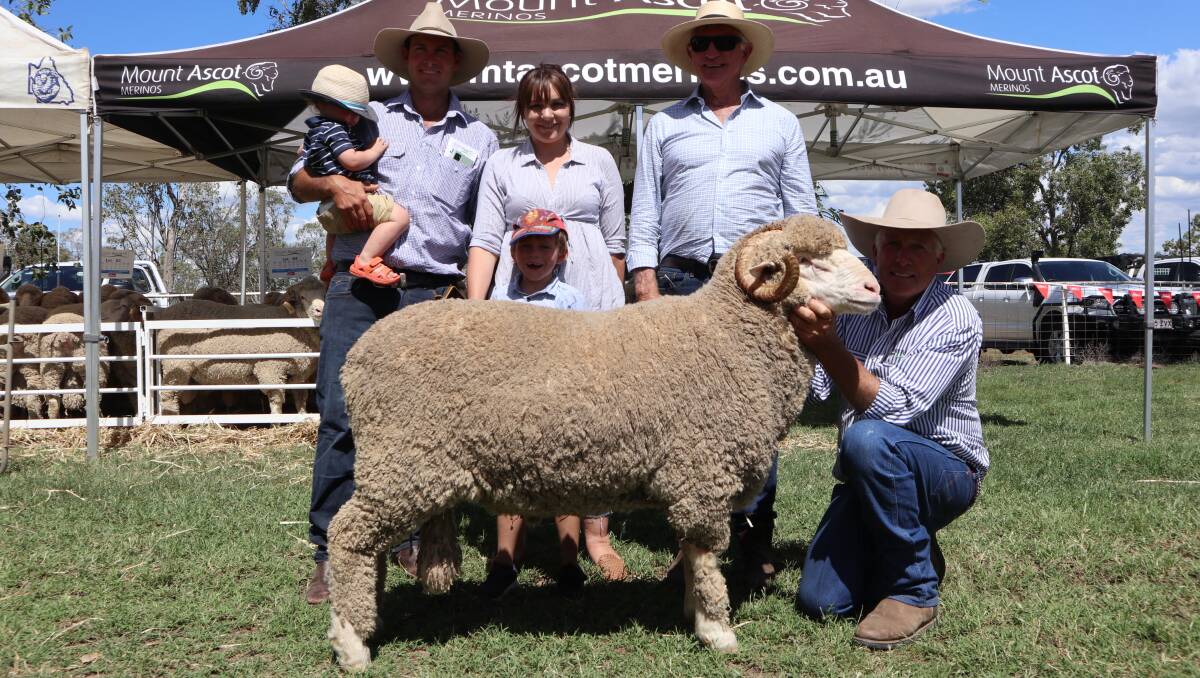  Mount Ascot top priced ram sold for $5000 and is pictured with Aaron and Katie Little and children, Bob Little and Nigel Brumpton.