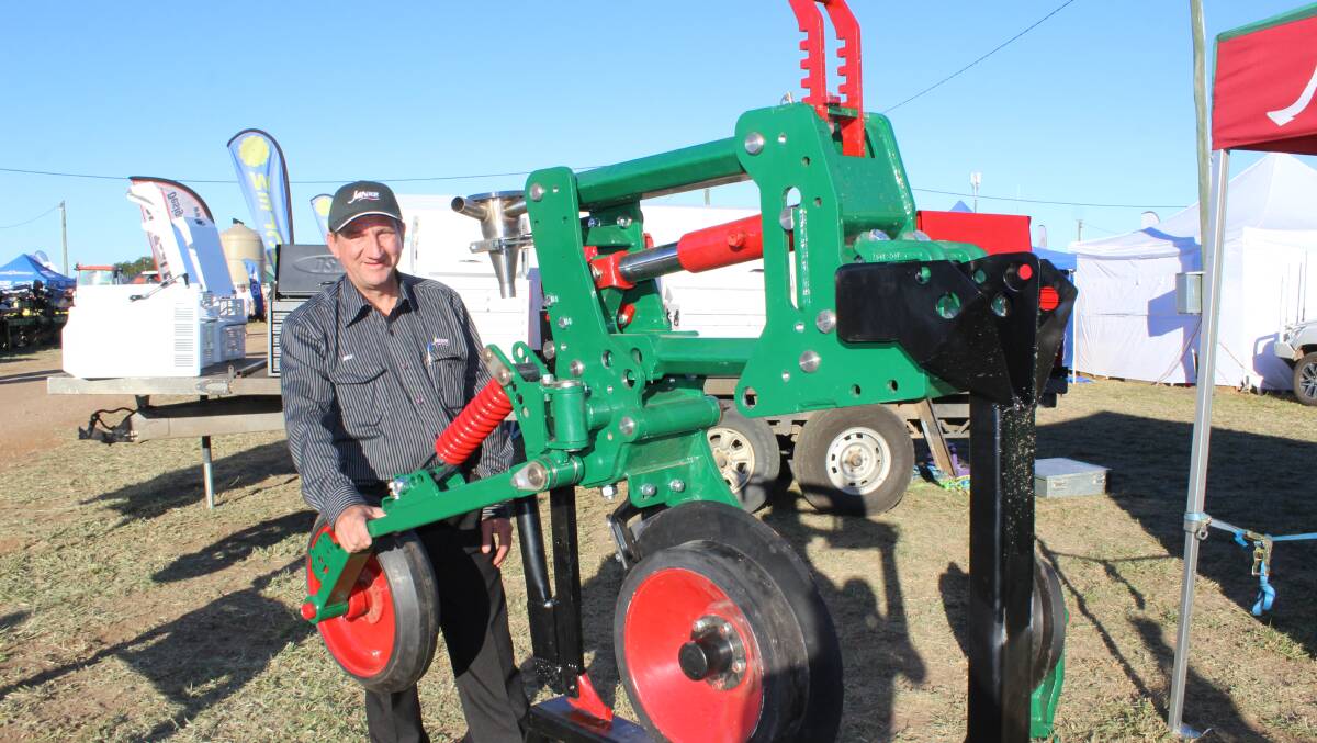 Michael Pearson, managing director of Janke Australia, Dalby, with the Australian-made Parallelogram planting unit.