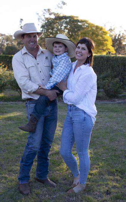 Local Heros: Justin and Kate Boshammer with their son Theo in the garden near Condamine. Picture supplied. 