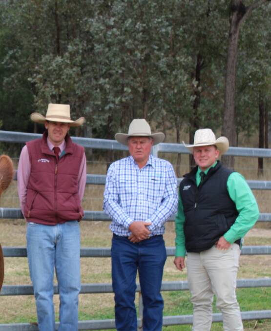 CL Squires auctionner Rob Bloch, vendor Andrew Moore, Lucrana Simmentals, Texas, and Colby Ede, Nutrien Stud Stock, Toowoomba. 