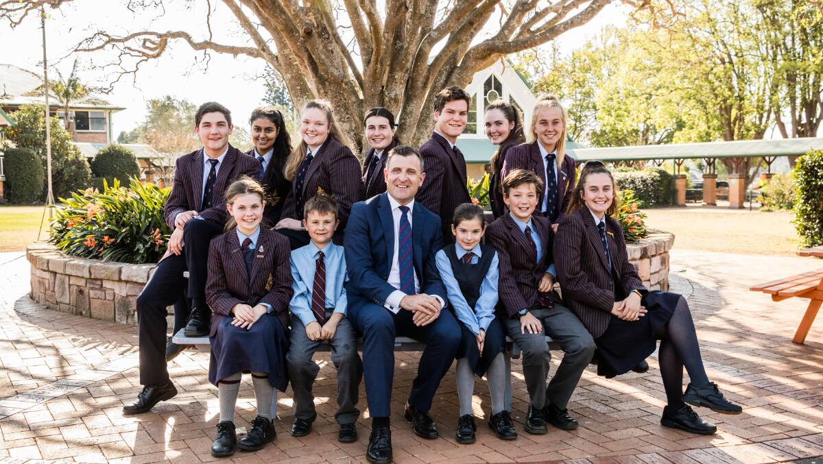 Toowoomba Anglican School principal Simon Lees with some students. 
