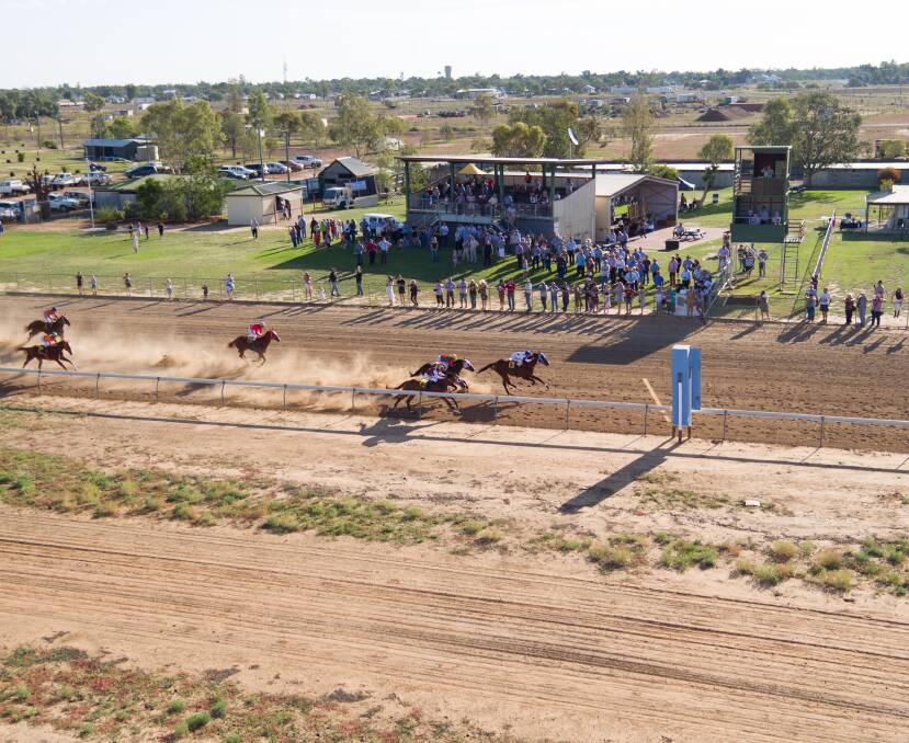 Dust flies in the Battle of the Bush qualifier as Fab's Cowboy held off Classic Wind and Louppy Bend to win the race. Picture: Cunnamulla and District Diggers Race Club.