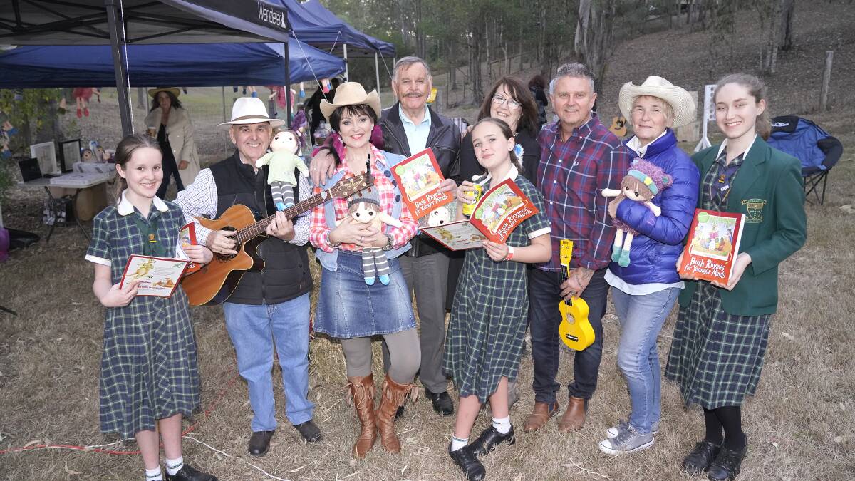 Contributing to an artistic ‘festival of hope’ for drought farmers were school students from Brigidine College, Indooroopilly, Jemima Davies, Tara Bissett and Elise Cotteril with, from left, Buderim musician Ken O’Flaherty, Vanessa Bissett, Jim Bowden, writer, Tina Mitchell, Aged Care Art, and Steve and Jayne Murray, Vintage Mobile Coffee. (Photo by Barry Searle)