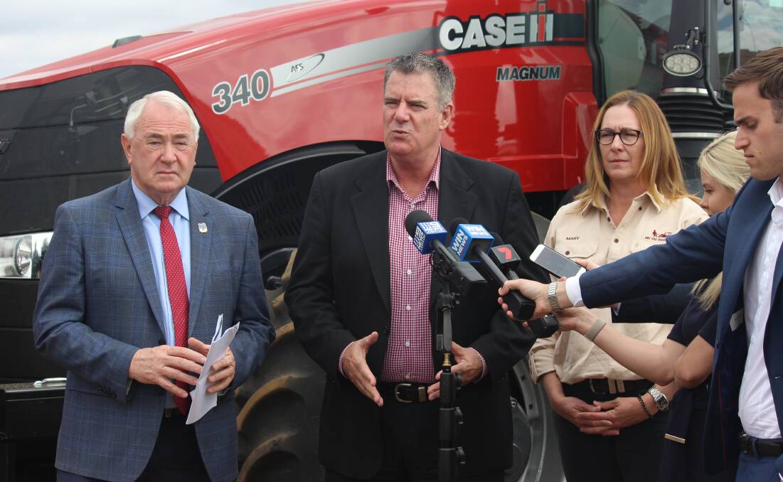 Are you bogged mate? Cr Paul Antonio, Mayor of the Toowomba Regional Council, with Minister for Agriculture Mark Furner, and mental health advocate Mary O'Brien at the launch.  