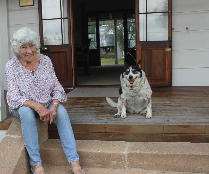 Jan Moir and her faithful companion Jack take in the stunning views from the front steps of Rosenthal Homestead. Pictures: Helen Walker 