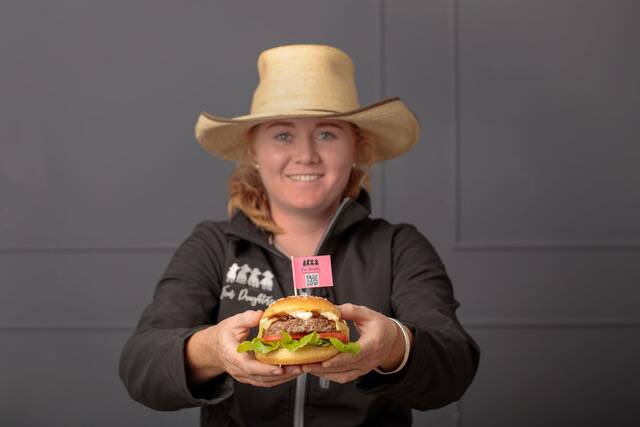  Jemima Penfold with the Four Daughters premium Australian Angus Burger which was released at the Teelba Field Day recently.
