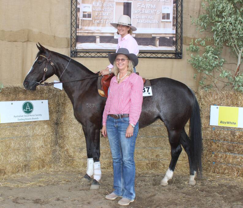 Belinda Barnes astride Narrego Miss Spinductor who sold for $42,000 to Robert and Coralie Daly, Hillcrest, Roma, and pictured with Coralie.