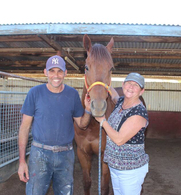 Longreach horse trainer Mark Oates with stable favourite, Go Sai, who he trains for racing enthusiast Julie Eggerling. Mrs Eggerling has bred and raced horses in the central west for 30 plus years.  Picture Helen Walker