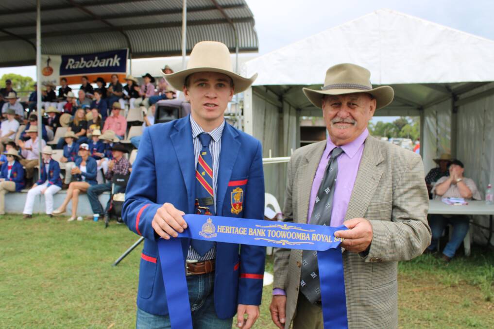 Winner of the Toowoomba Royal Show young judges competition is Peter Yeomans with over judge Graeme Hopf. Pictures Helen Walker. 