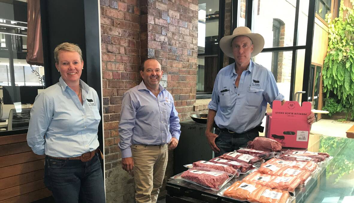 Karen and Dan Penfold, and Justin Heaven, TSBE, with the Four Daughters Premium Black Angus beef box, packed and delivered directly to the customer by the couple. 