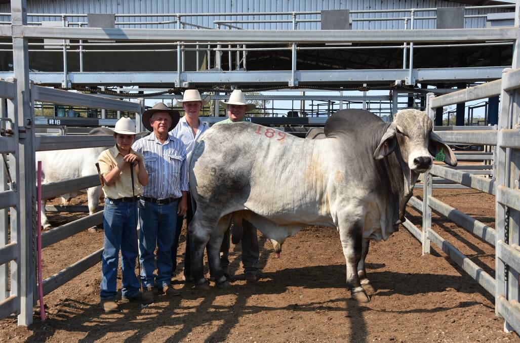 Sale topper: Joint buyer Jack Fenech, 14, with vendor John Kirk, joint buyer Walter Wilson, and Landmark's Mark Scholes with Carinya Milwaukee, which made $105,000 on Monday to emerge as top price bull. Picture: Jessica Johnston