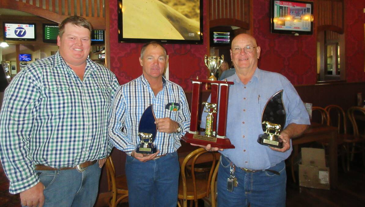 Brent Evans, with winner of the hoof section Midge Thompson and Alwyn Wolfe, winner of the hook section. Pictures: Faye Wolfe