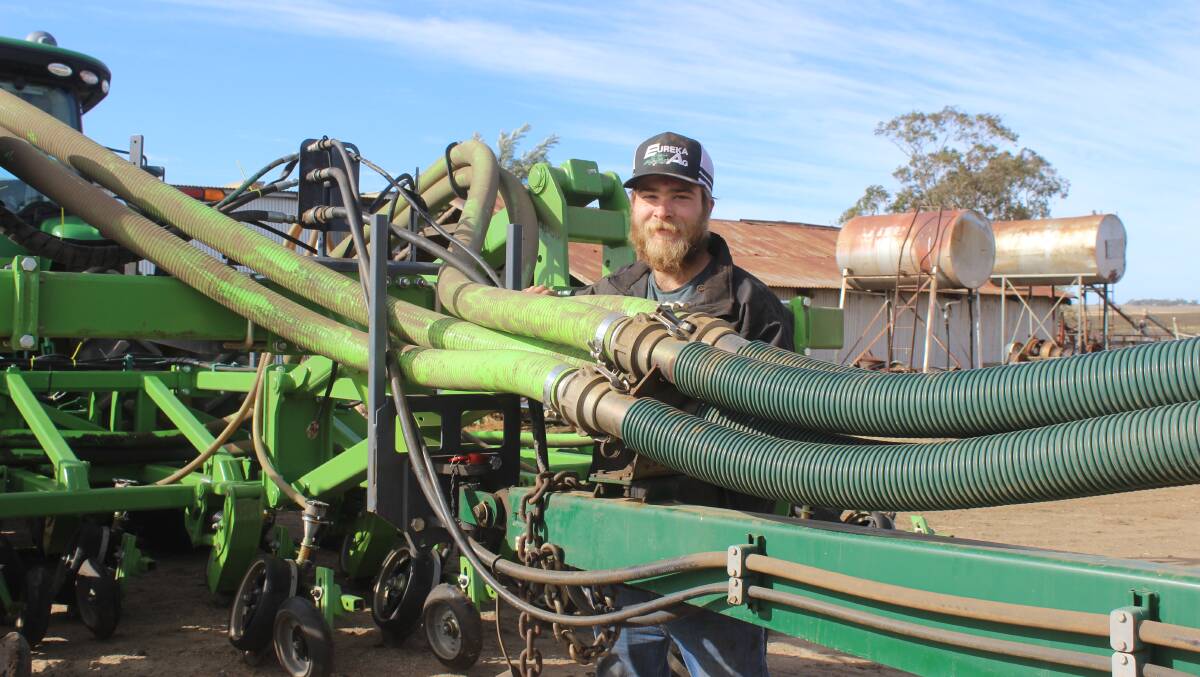 Ready to roll: Liam Free, Hamilton Farm, Clifton, checking the hoses on his planter as he prepares to plant his first ever barley crop on the family farm this week. 