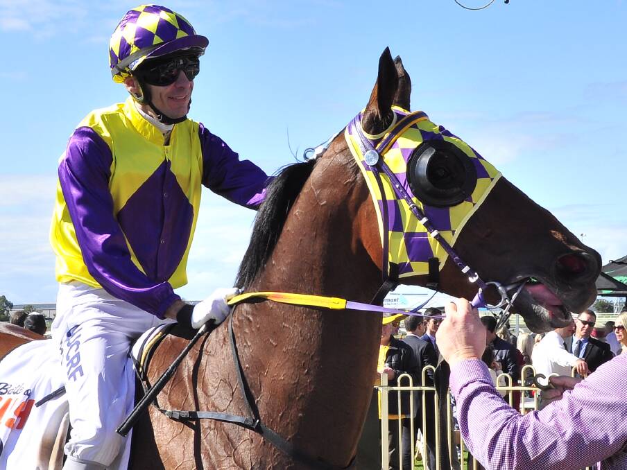 Jockey Justin Stanley brings Mason's Chance back to scale at winning the $100,000 Battle of the Bush series at Doomben. 