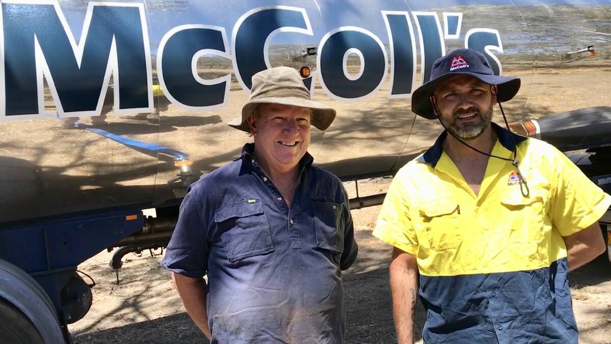Gerard Wren with McColl's driver Jamie Luke who delivered the water to his Dalveen property.