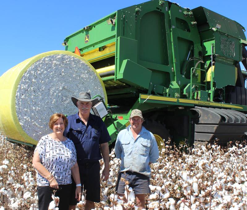 Harvest time: Cotton farmers Julie and Kerry Connolly, Perola, Bongeen with their farm manager Mike French and their John Deere 7760 baler picker which is doing its fourth season.