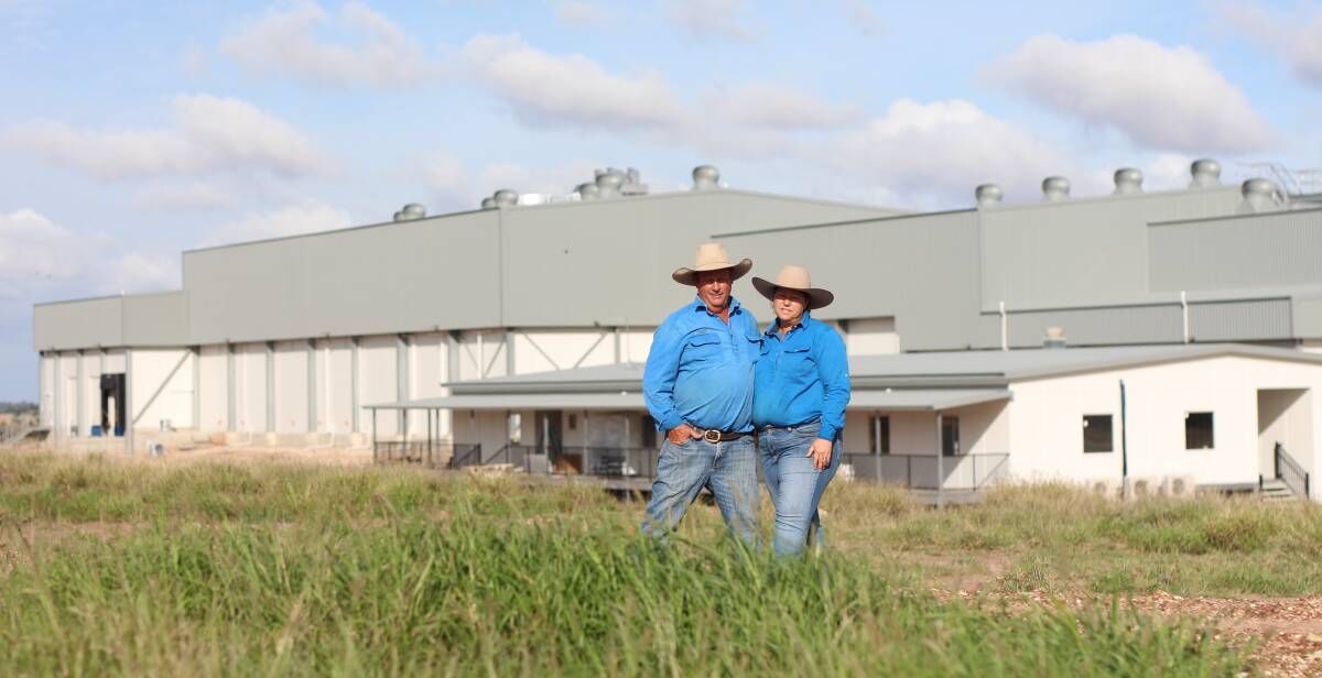 Blair and Josie Angus in the foreground of their multimillion beef processing facility near Moranbah. PIcture: Lauren Angus 