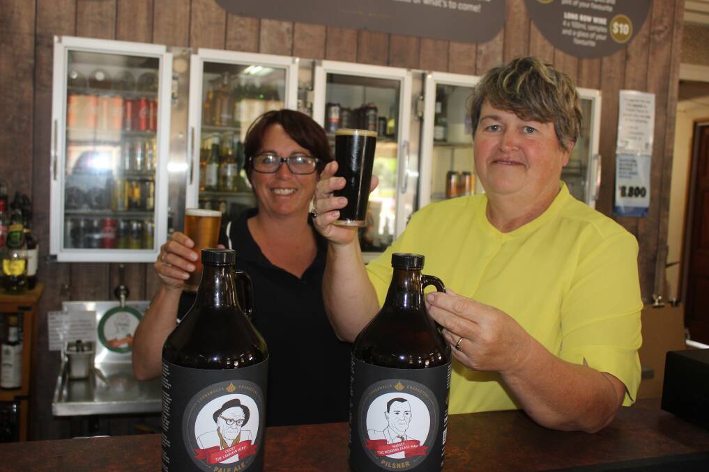 Sisters-in law Carla Mills and Peieta Mills pour a coldie from one of the five hand crafted beer varieties the from the ‘Cunnamulla Characters' collection they offer guests. Picture Helen Walker