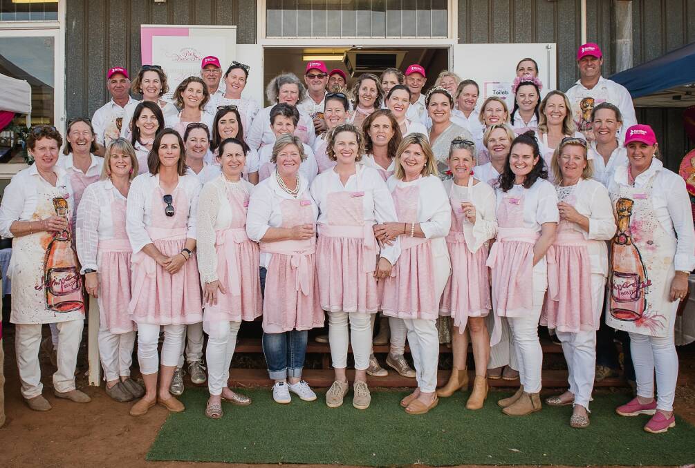 The women and men behind Weengallon Pink Ladies Day have hung up their aprons for the last time. Picture: Rachel Walker Photography