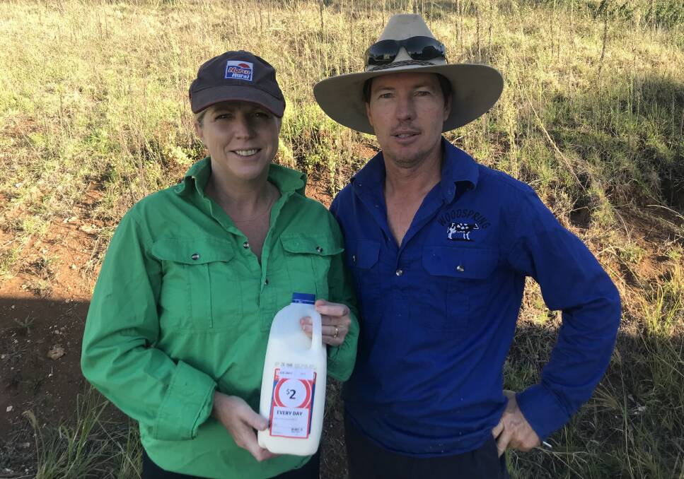 Donna and Mark Fitch, Woodspring, Kulpi, are third generation dairy farmers, but $1/L milk and tough seasonal conditions are taking a toll. They say consumers must buy branded milk to support the industry.