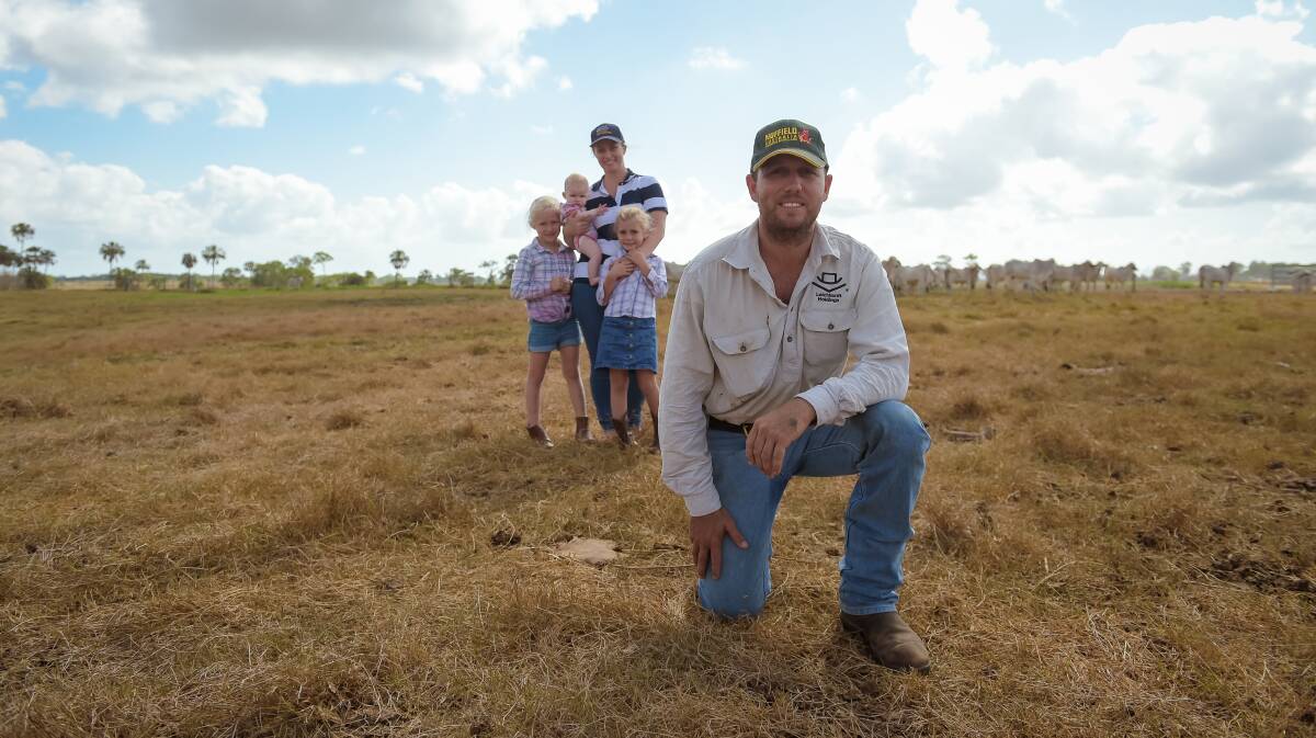 Stewart Borg at home on his Sarina beef property in North Queensland with wife Sarah and their young family.