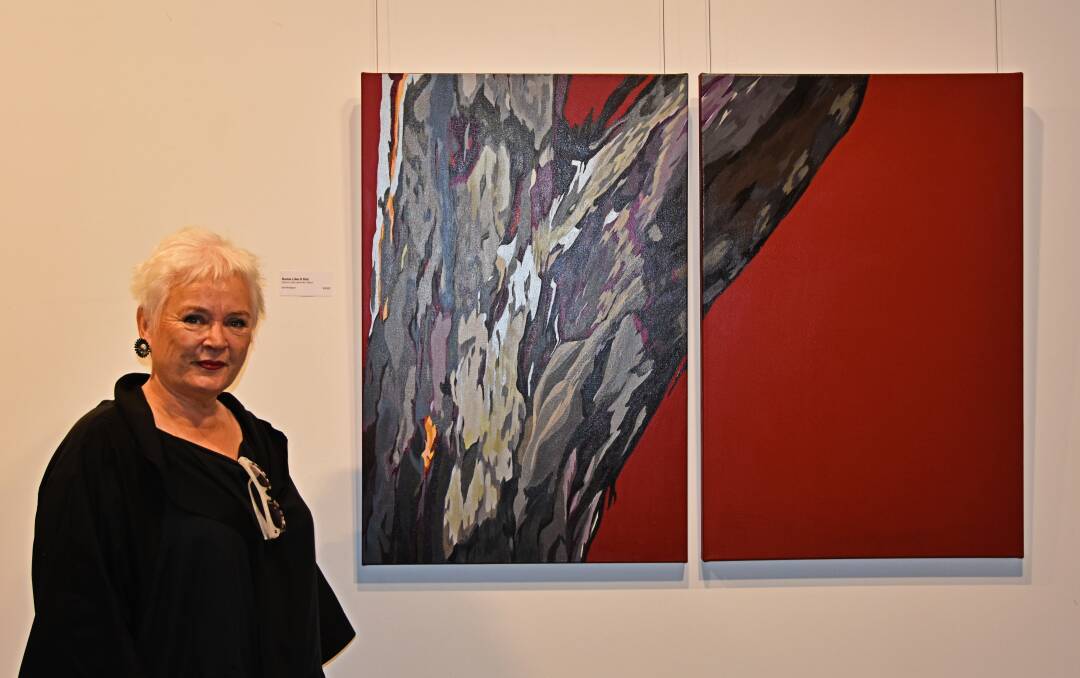 Ida Montague, Sunshine Coast, with her piece, 'Some Like it Hot', at the exhibit opening in Roma.