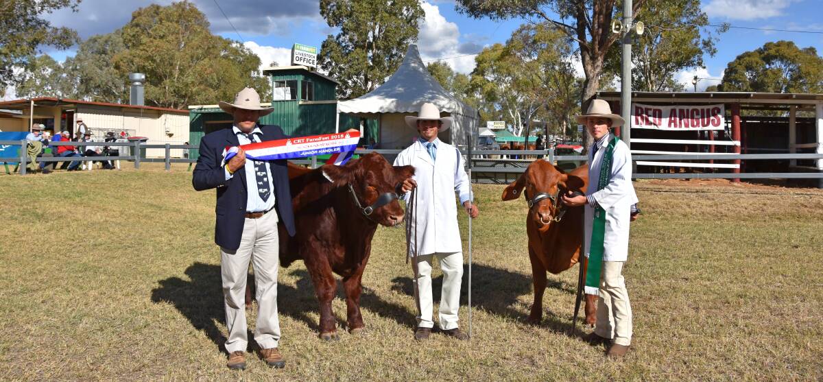 Young paraders' judge Ben Toll, Dubbo, grand champion parader, Lawrence Sehmish-Lahey, Goondiwindi, with Amavale Nicholas N2, and reserve champion parader, Alex Holmes, Warwick with Oakmore Granda. 