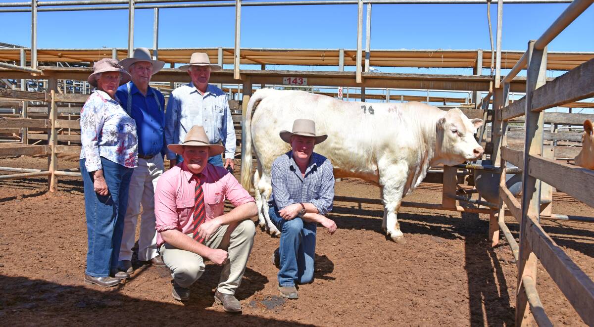 Janice and Bernie Hayward, Advance Charolais, Allora, Pat Bredhauer, Lambert Charleville, Gus Foott, Elders, Charleville, and Scott Bredhauer, Lambert, Charleville, with the top-price bull, Advance Mascot M116, which made $11,000.