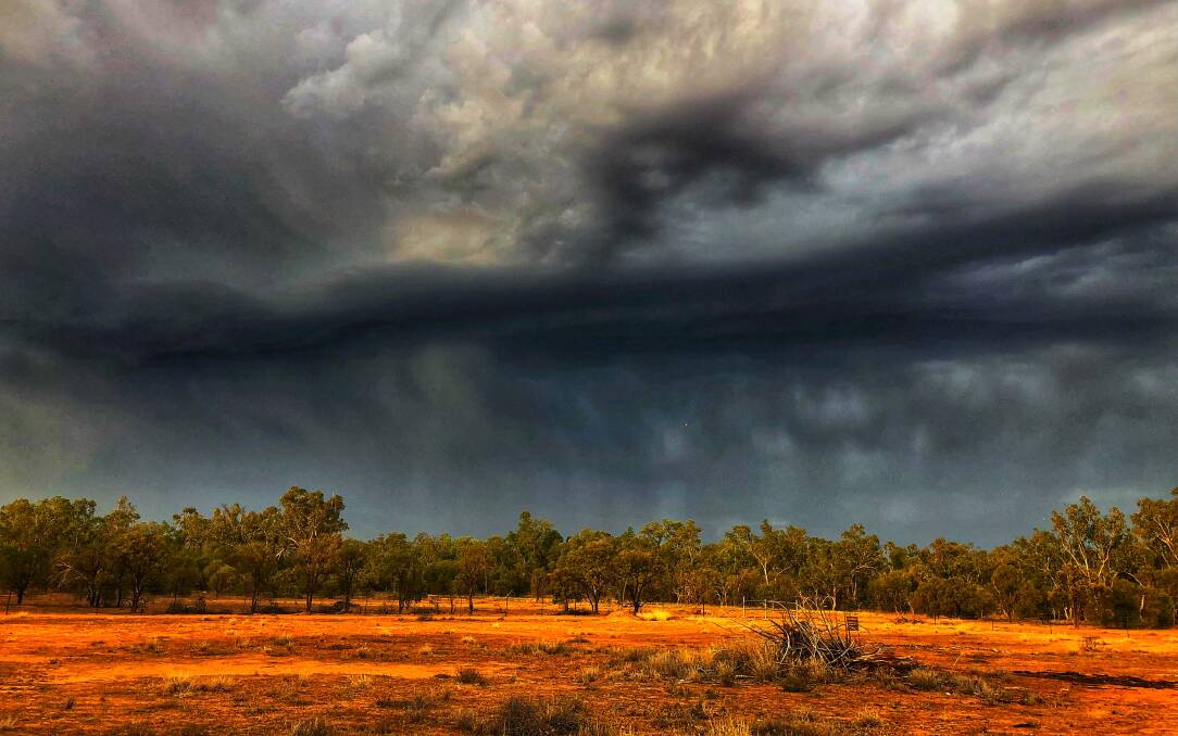 Darryl Duff took this photo of storms rolling into Charleville on Wednesday morning, unfortunately it only yielded a sun shower.