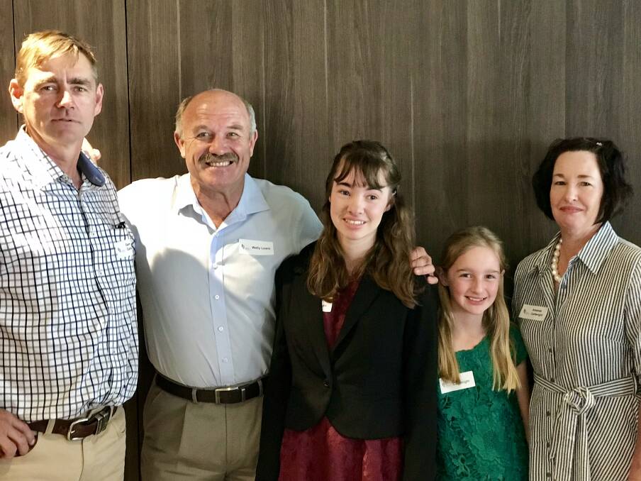 Garry, Paige, Amy and Amanda Cartwright, Roma, with Epilepsy Queensland patron Wally Lewis. 