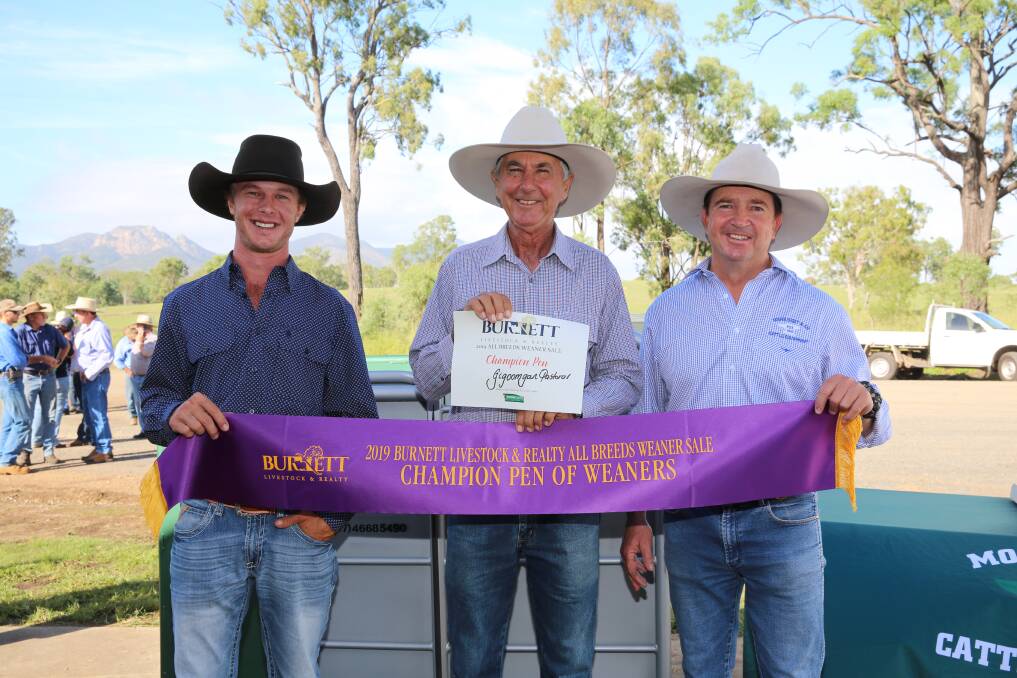 Winners of the Champion Pen of Weaners, Ewan and Les Rockemer, Gigoomgan Pastoral, Brooweena, with their prize of a Morrissey & Co calf cradle and Sean Morrissey from Morrissey & Co. Pictures: Stephanie Whitaker.